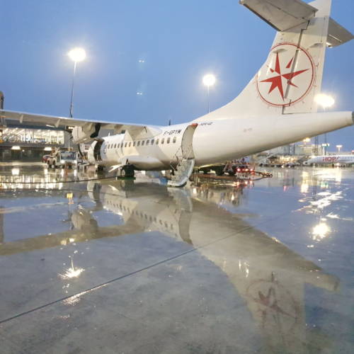 MK Partnair Fleet Airliner ATR 42 Exterior Tarmac Rain