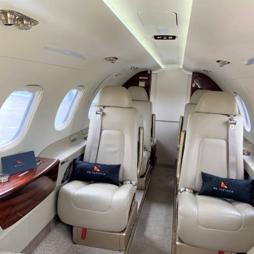 MK Partnair Fleet Private Jet Phenom 300 interior Cabin branded